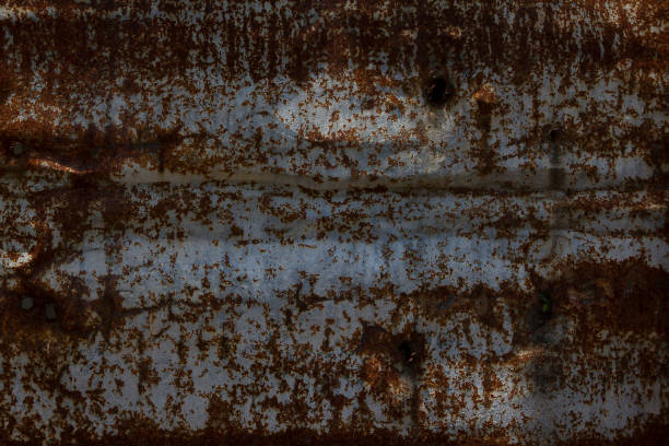 istock Old rusted zinc sheet from the use for a long time. 1007940160