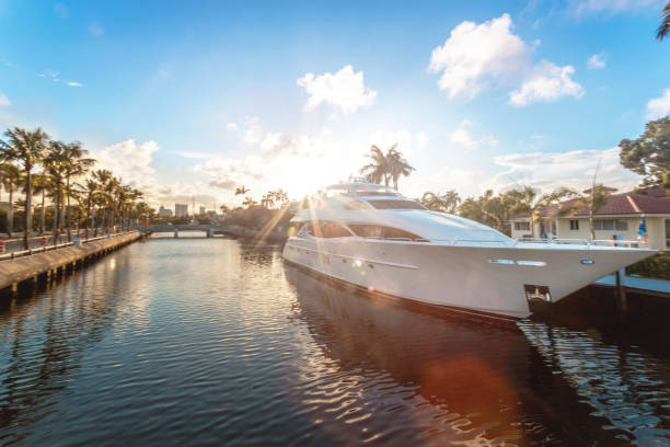 Sunset at Fort Lauderdale canals. Luxury yachts in Las Olas Boulevard, Florida, USA stock photo