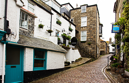 Houses on steep road in English town