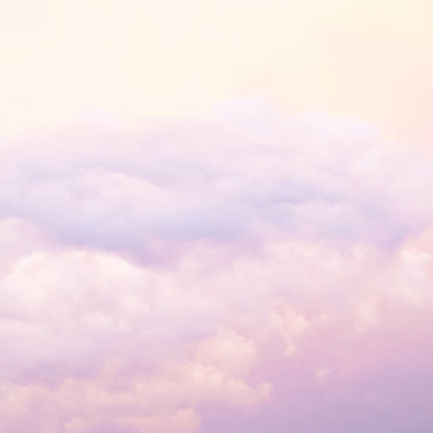 istock Colorful cloudy bright sunset sky abstract texture background 1007946770