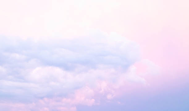 istock Colorful cloudy bright sunset sky abstract texture background 1007946778