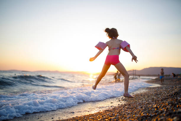 Funny girl at beach