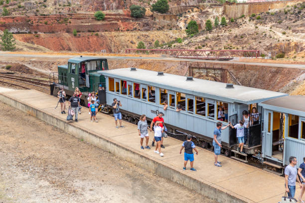 Rio Tinto mines. Huelva, Spain. July 4, 2018. Touristic train to visit the mining park of Riotinto. People go out of the train at the end of the visit of the mining park.