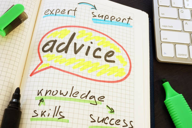 istock Advice handwritten in the notepad. Mentoring concept. 1007950600