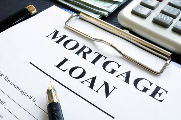istock Mortgage loan form, money and calculator. 1007951006