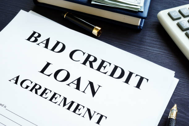 istock Bad credit loan agreement, dollars and pen. 1007951048