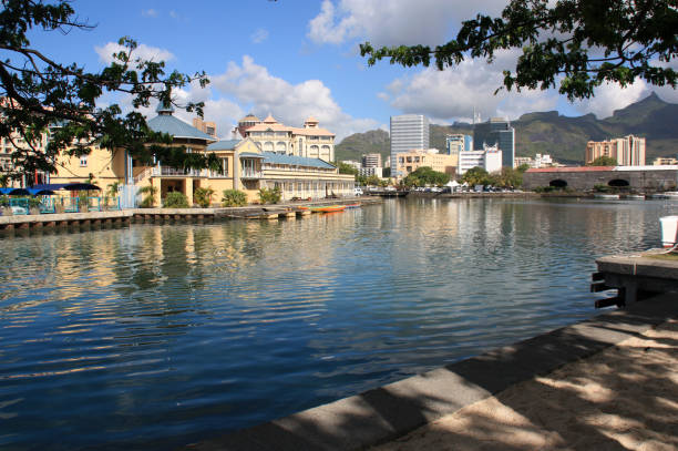 Port Louis, Mauritius, November 12th, 2009. The Caudan Waterfront is a shopping mall in the harbor of Port Louis. It is very popular, a lot of locals are visiting this area every day.