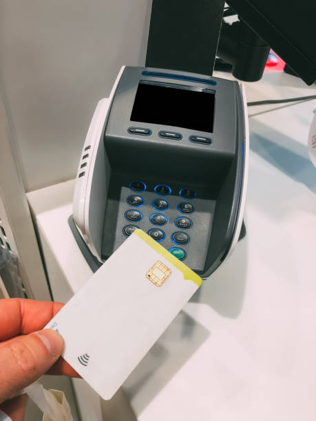 istock Payment terminal with a contactless card 1007961308