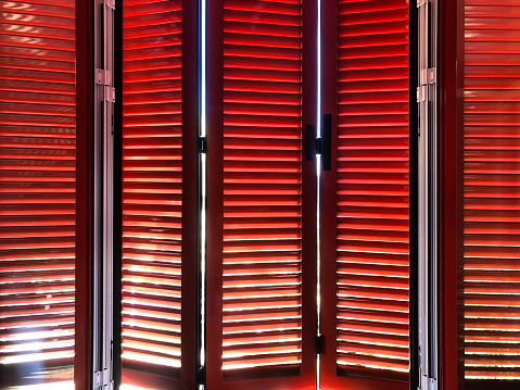 Red metal blinds windows
