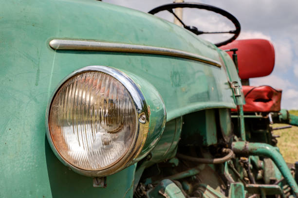istock The headlight of the old tractor. 1007968200