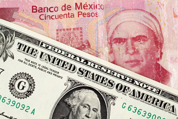 istock Mexican 50 Peso Note With An American One Dollar Bill 1007973294