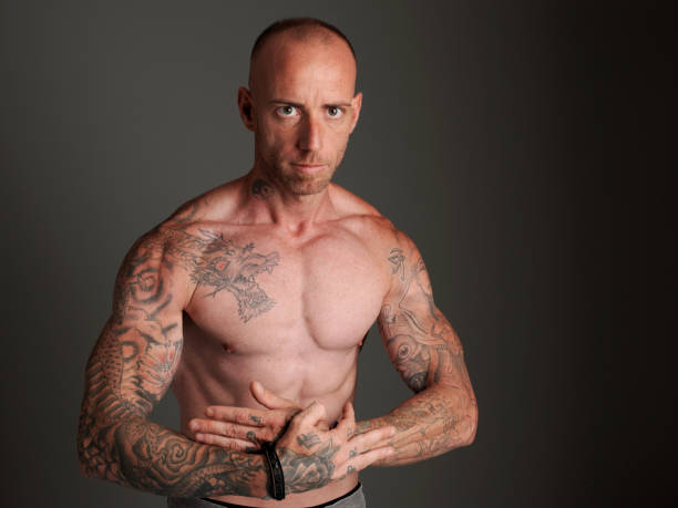 istock Young bodybuilder showing his physiognomy. 1007973740