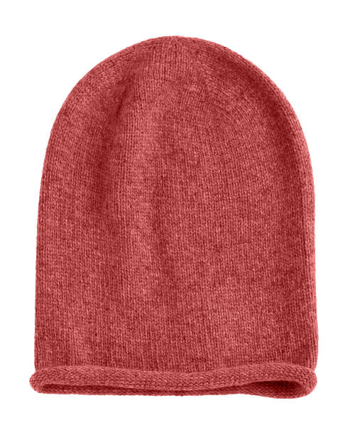 istock Red carrot long beanie autumn hat isolated 1007973798