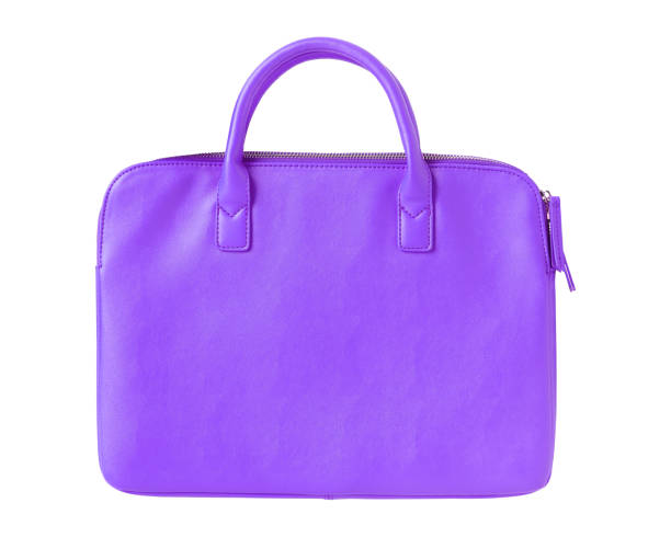 istock Violet modern elegant woman leather laptop bag isolated on white 1007973900