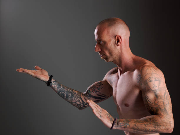 istock Young bodybuilder showing his physiognomy. 1007973980