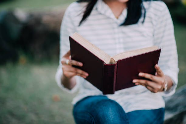 istock Girl reading Love reading is a life-giving experience. Love Studying Educational Ideas And reading 1007980418