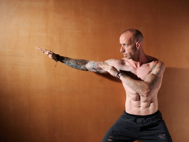 istock Young bodybuilder showing his physiognomy. 1007987084