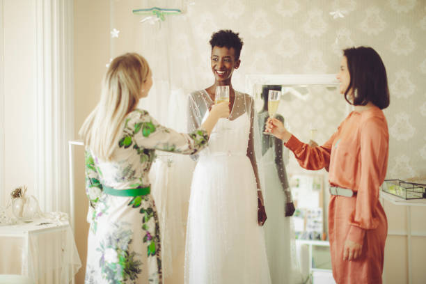 istock The bride is trying out her wedding dress 1007990706