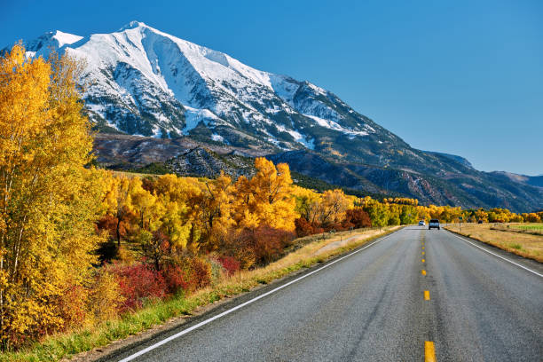 istock Highway at autumn in Colorado, USA. 1007990736