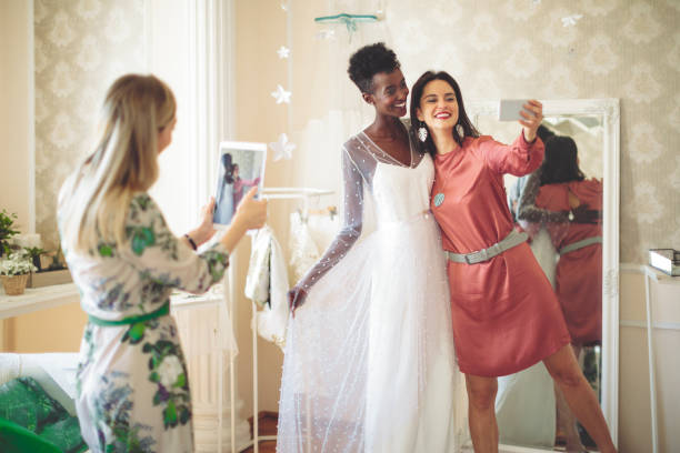istock The bride is trying out her wedding dress 1007990762