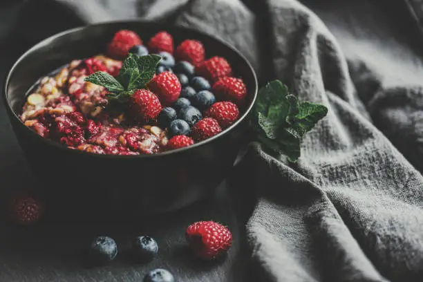 Healthy Eating – gluten free, organic overnight oats with quinoa, goji berries, blue berries and cherries