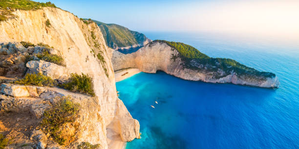 istock Navagio Beach (Shipwreck beach) at sunrise on Zakynthos, Greece 1007991280