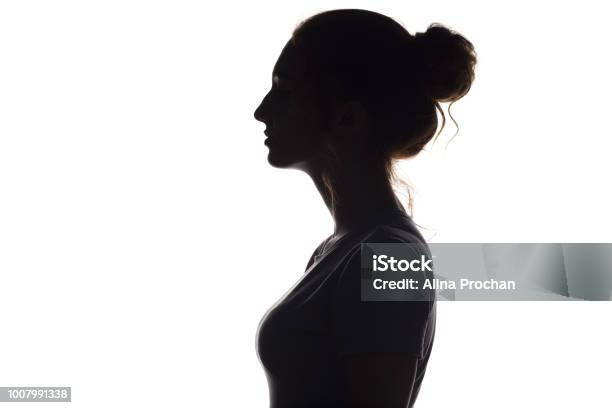Silhouette Profile Of Beautiful Girl On A White Isolated Background Stock Photo - Download Image Now