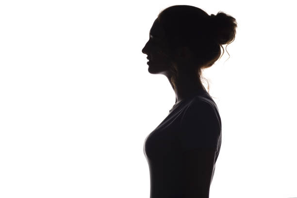 istock silhouette of a woman on a white isolated background, 1007993498