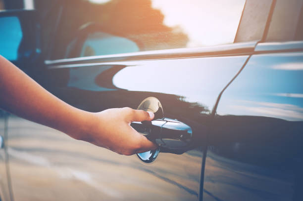istock Open the car black door 1007993884