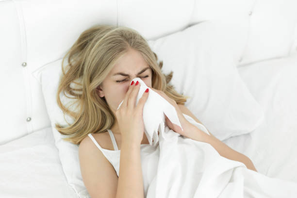 istock Sick woman on bed 1007993958