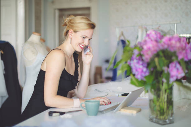 portrait of a successful fashion designer - independence business women manual worker imagens e fotografias de stock