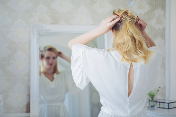 Bride trying on a pearl jewerly