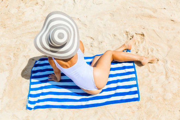 istock Woman at tropical beach 1008005092