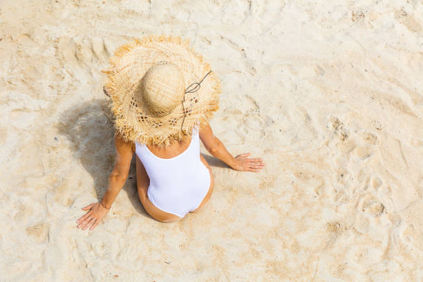 istock Woman at tropical beach 1008005096