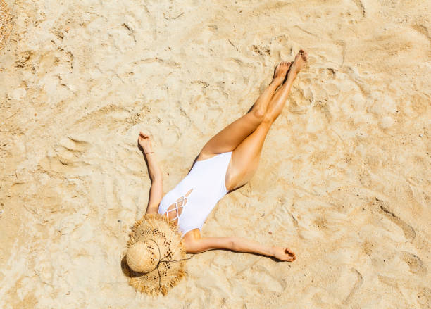 istock Woman at tropical beach 1008005110