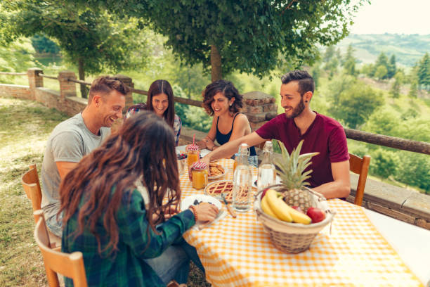 istock group of friends doing breakfast outdoors in a traditional countryside 1008005712