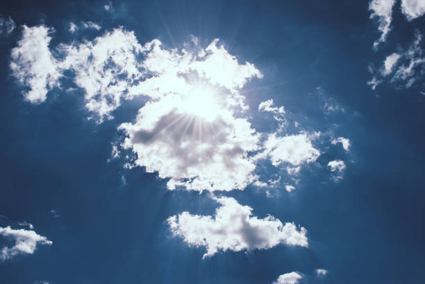 istock Blue sky with clouds and sun. Perfect background 1008018890