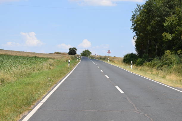 istock lonely country road in late summer 1008019044