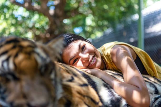 Tourist with tiger cub