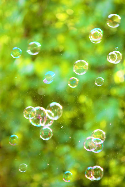 istock Soap bubbles on an abstract background. Pay attention to the blurred image. 1008024968