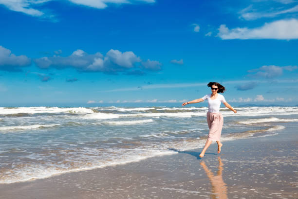 istock Happy girl on seashore in Rimini 1008027524