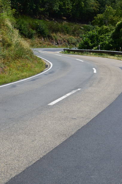 istock lonely country road in late summer 1008030272