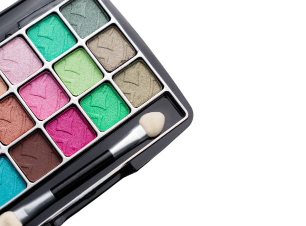 istock Makeup set, colorful, white background, brushes and pallete 1008030636