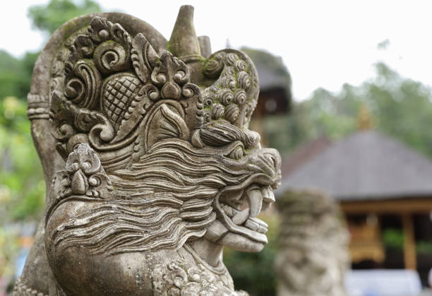 istock Balinese ancient stone sculpture. Bali, Indonesia. 1008037038