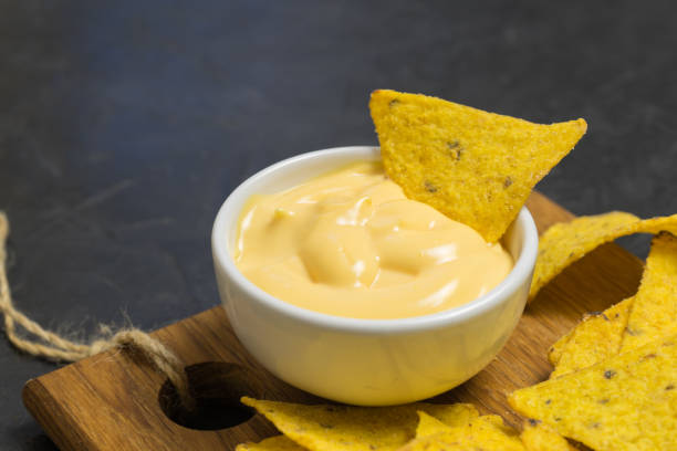 istock Nachos corn tortilla chips. Nachos with cheese. place for your text. 1008064616
