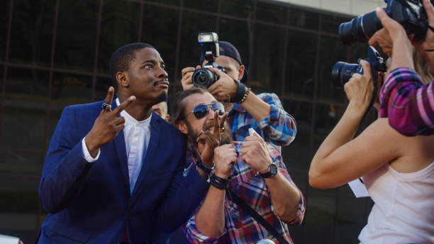 istock Famous ethnic actor giving autographs 1008070370