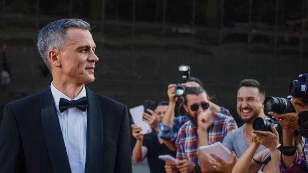 istock Adult famous man on red carpet 1008070438