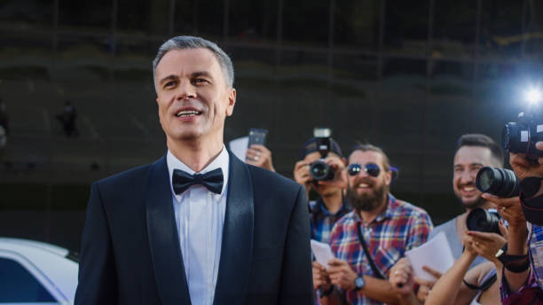 Adult famous man on red carpet