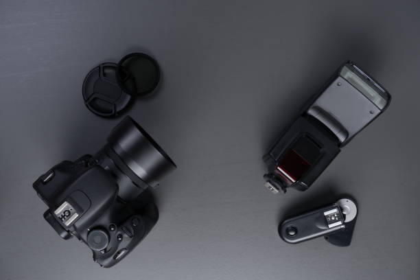 istock Photography concept with dslr lense flash and acessories 1008105242