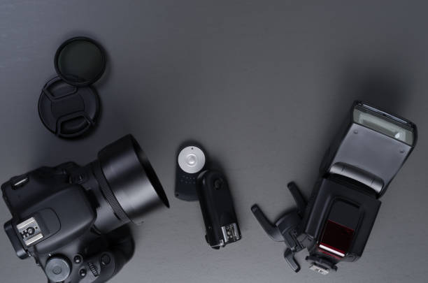 istock Photography concept with dslr lense flash and acessories 1008105360